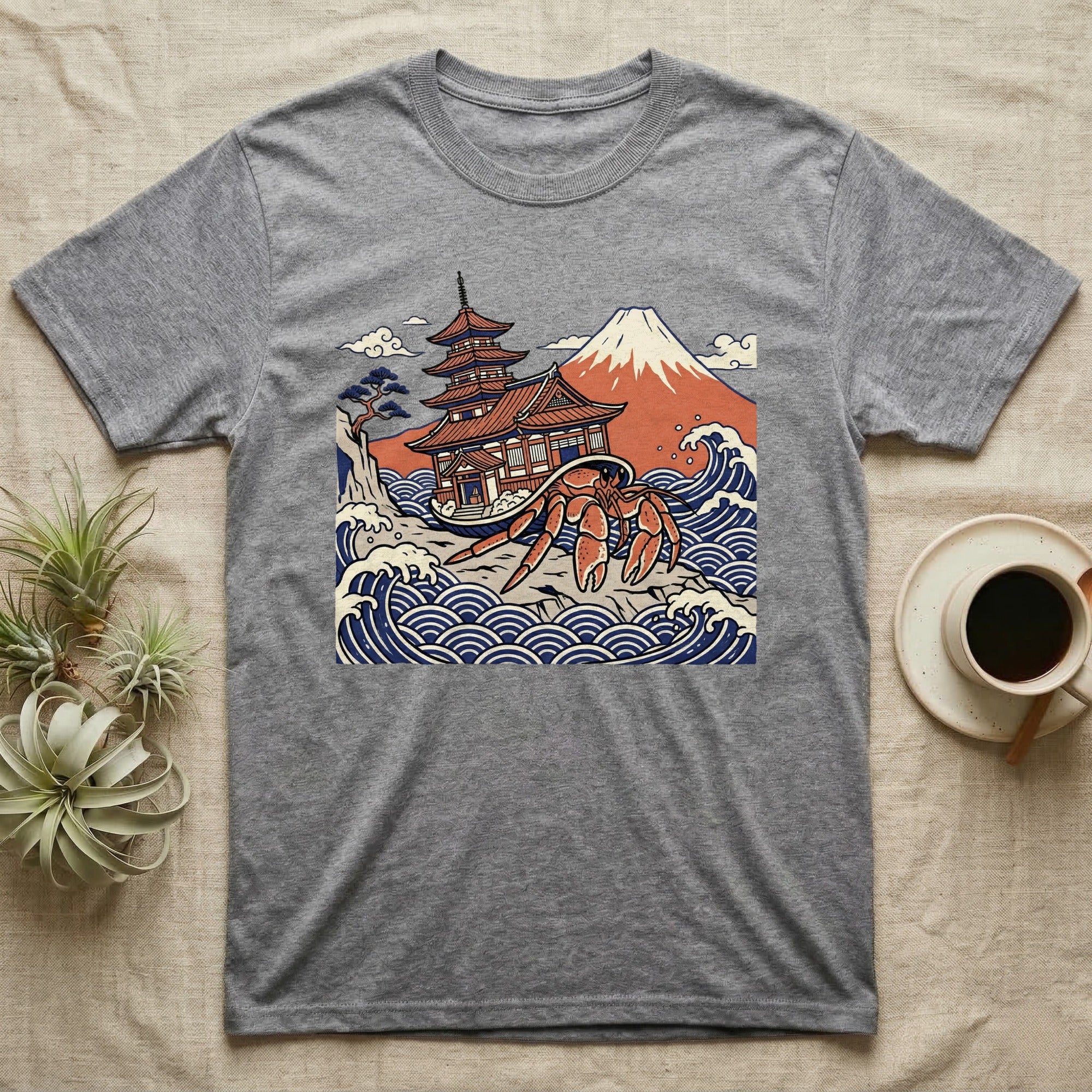 Grey t-shirt with a Japanese-style illustration of a crab, pagoda, and Mount Fuji.