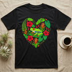 Black t-shirt with a colorful heart of tropical plants and a red-eyed tree frog.
