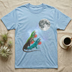 Green Anole Moon Howl T-Shirt in Light Blue — Three Green Anole colour morphs howling at a full moon over a nebula on a dark grey t-shirt.