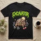 Russian Tortoise Feral T-Shirt in Black — Chubby Russian tortoise munching a green in a pastel meadow under a spiky lime metal wordmark reading EXCAVATOR.