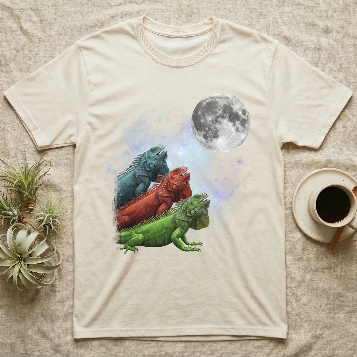 Green Iguana Moon Howl T-Shirt in Natural — Three Green Iguana colour morphs howling at a full moon over a nebula on a dark grey t-shirt.