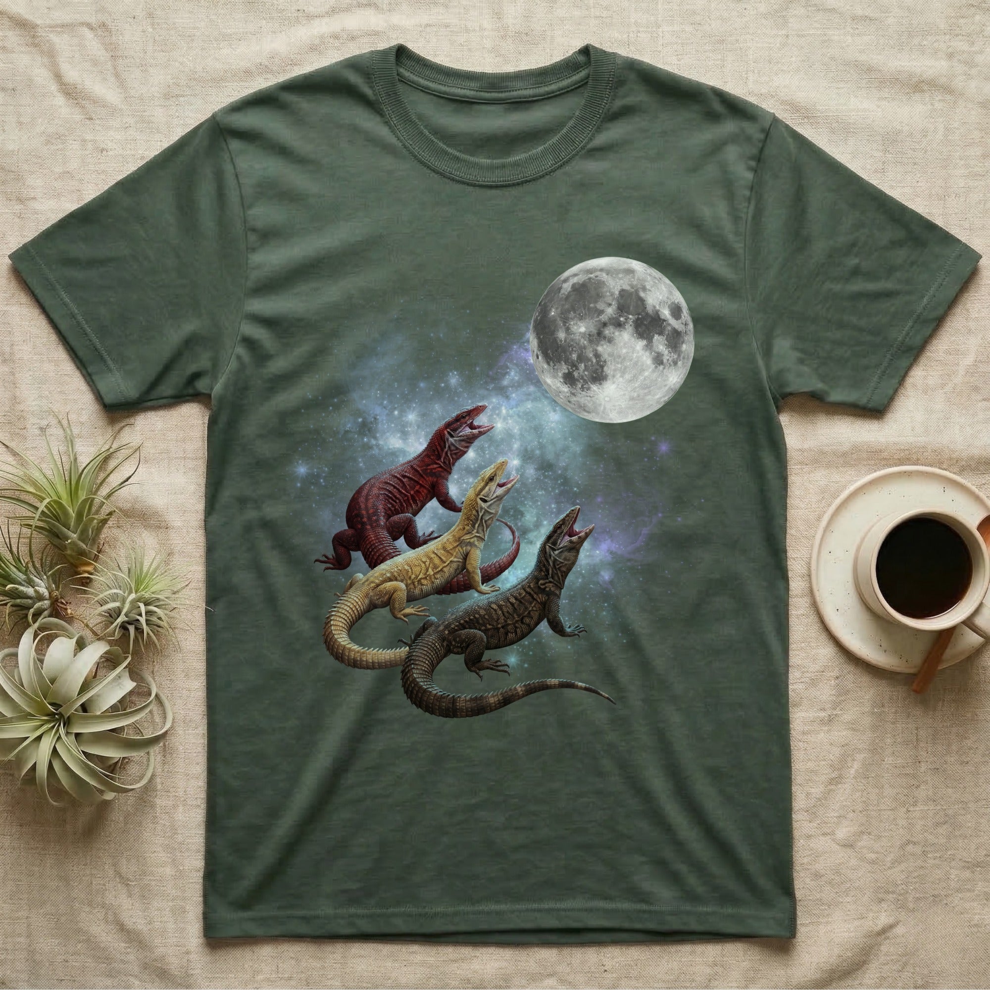 Ackie Monitor Moon Howl T-Shirt in Military Green — Three Ackie Monitor colour morphs howling at a full moon over a nebula on a dark grey t-shirt.