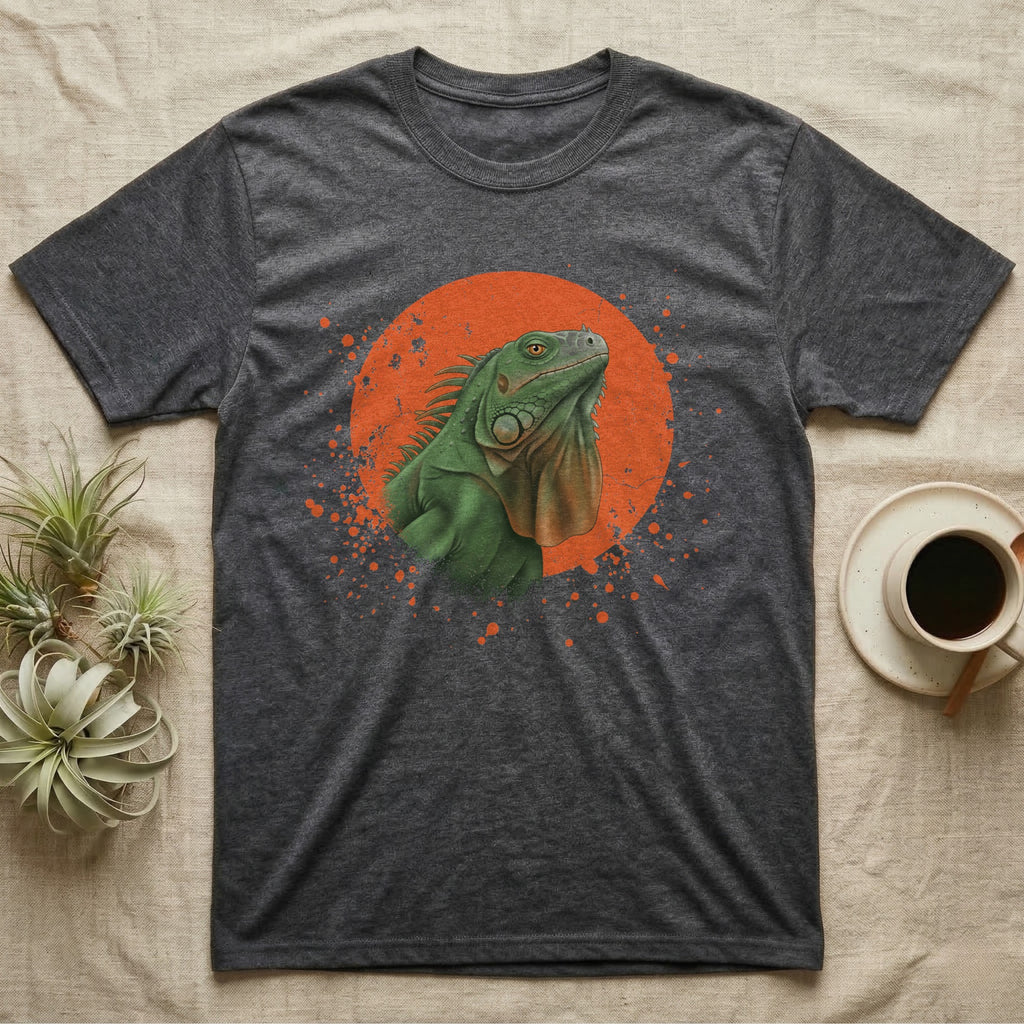 Green Iguana Stink Face T-Shirt in Dark Heather — Distressed vintage-style illustration of a green iguana with its dewlap fully dropped and chin lifted, on an orange disc.
