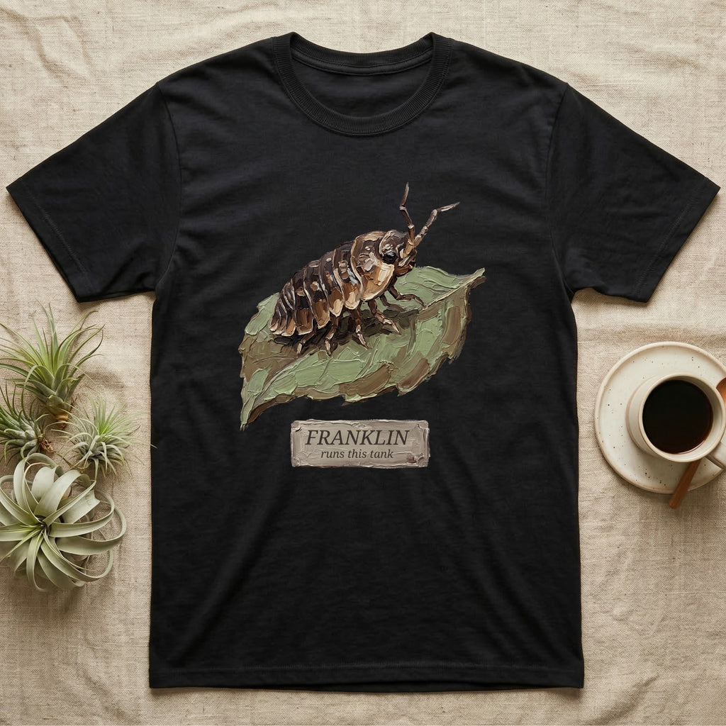 Franklin Isopod Tank T-Shirt in Black — Impasto oil-painting portrait of an isopod on a leaf with an engraved Franklin name-plate beneath the subject.