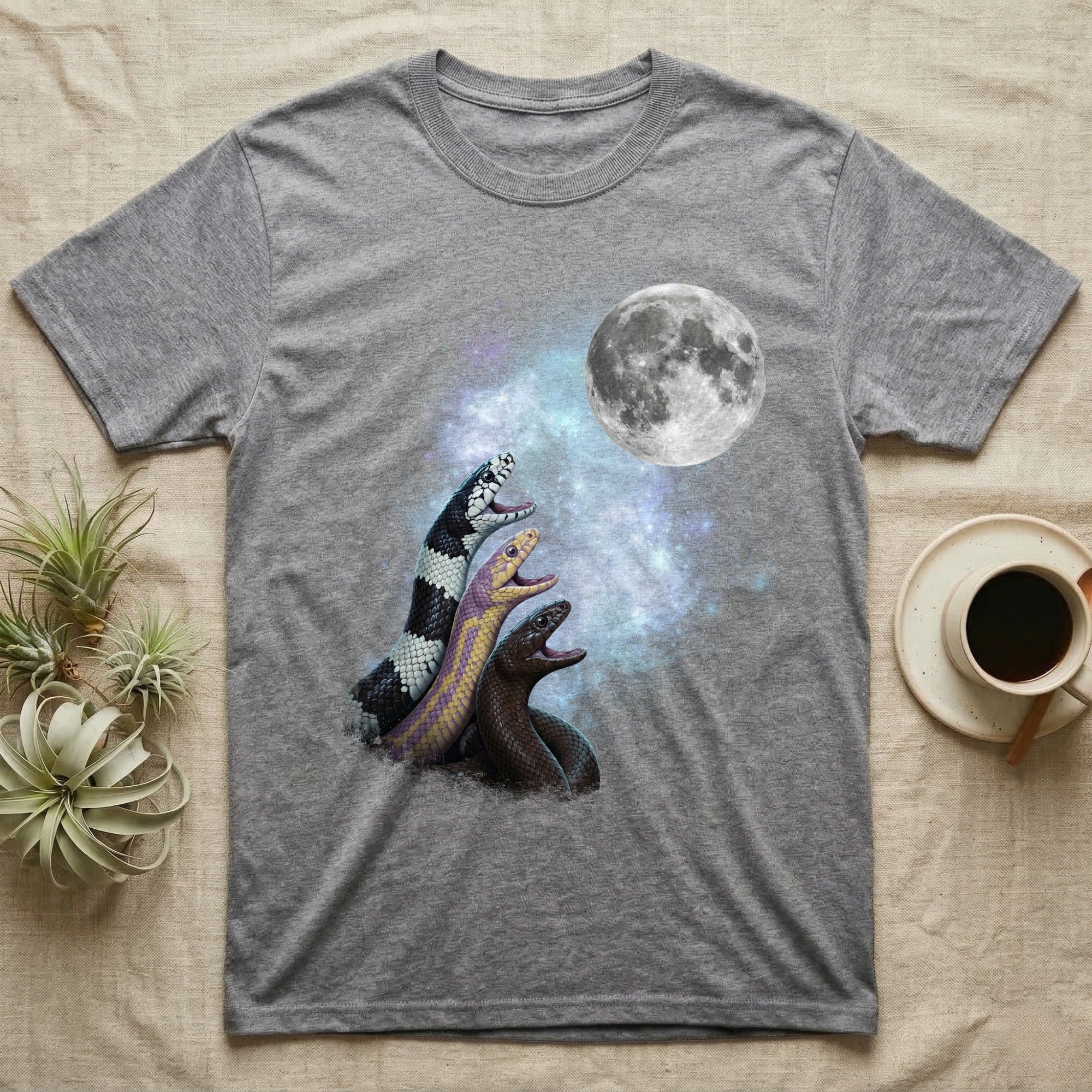 California Kingsnake Moon Howl T-Shirt in Sport Grey — Three California Kingsnake colour morphs howling at a full moon over a nebula on a dark grey t-shirt.