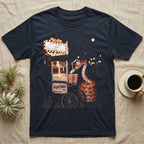 Corn Snake Popcorn Cart T-Shirt in Navy — Corn snake coiled beside a vintage popcorn cart holding a scoop over paper boxes under glowing cinema marquee lights.
