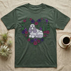 Green t-shirt with a white poodle in a floral heart design.