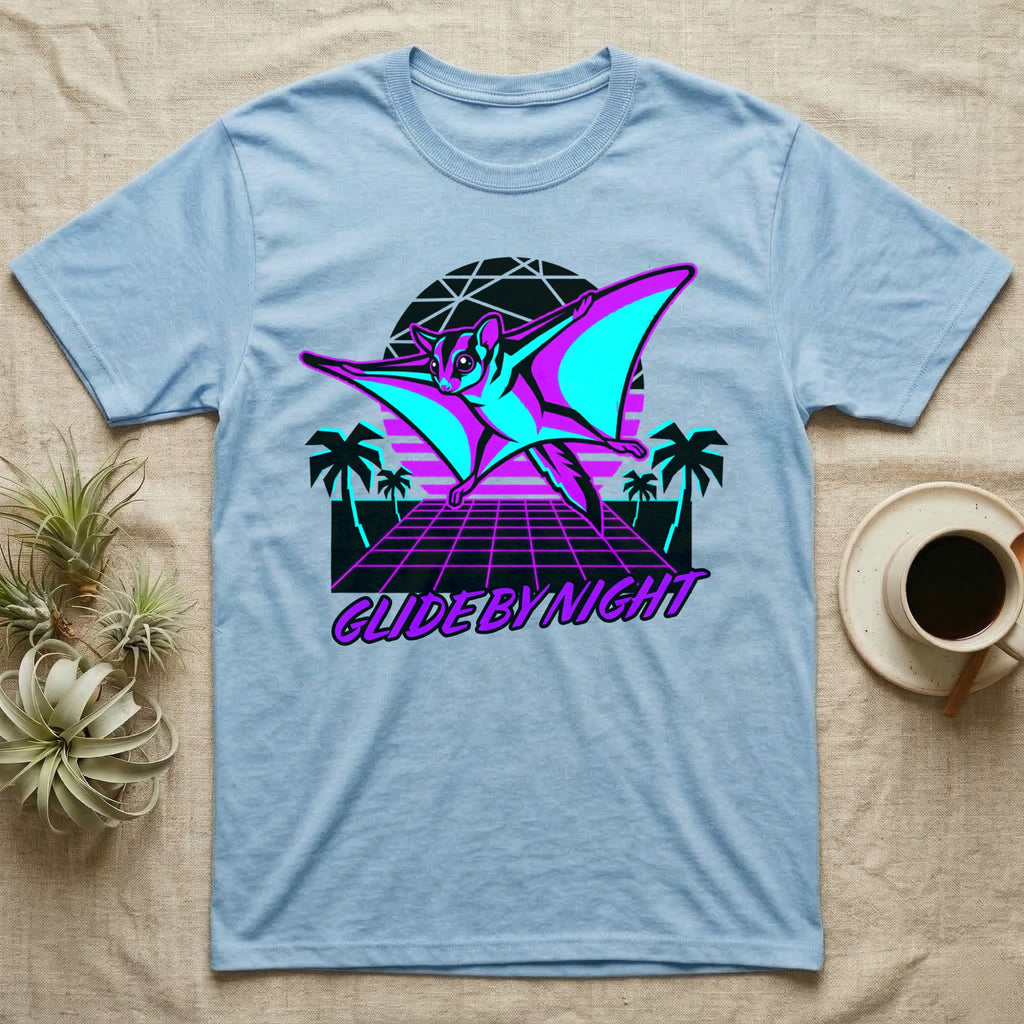 Light blue t-shirt with neon pink and turquoise flying sugar glider design.