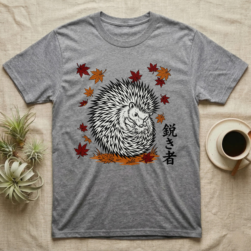Grey t-shirt with a black and white hedgehog and autumn leaves design.