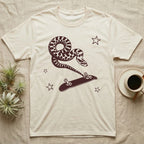 Western Hognose Kickflip T-Shirt in Natural — Distressed one-ink oxblood screenprint of a western hognose snake airborne, tail snapped straight into a skateboard caught upside down mid-kickflip.