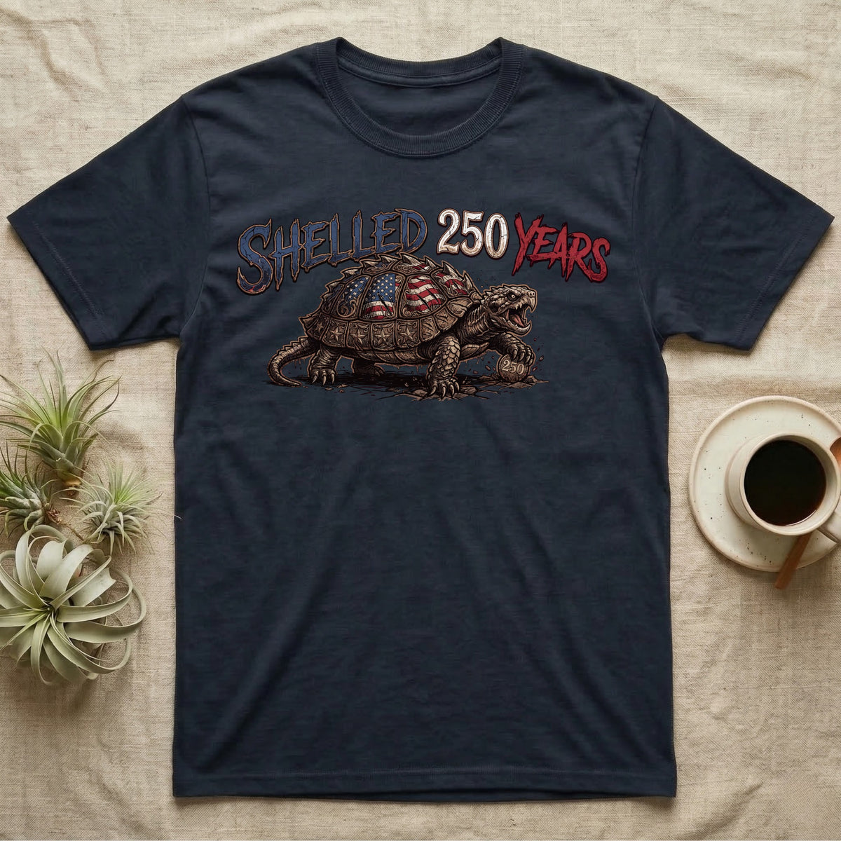 Snapping Turtle 250 T-Shirt in Navy — Gritty woodcut alligator snapping turtle with a flag-etched shell on a 250 coin under text Shelled 250 Years.