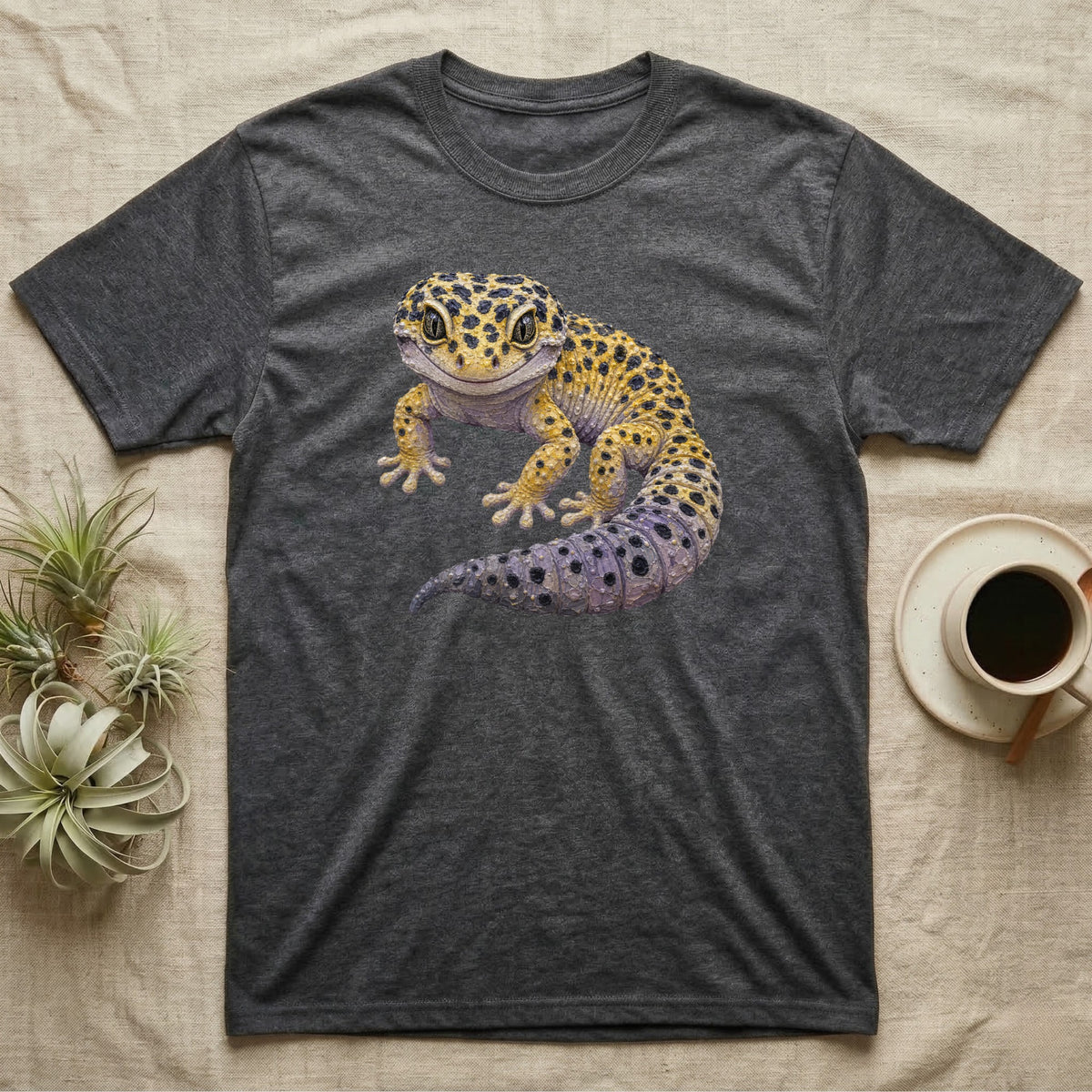 Dark grey t-shirt with a colorful leopard gecko graphic on the chest.