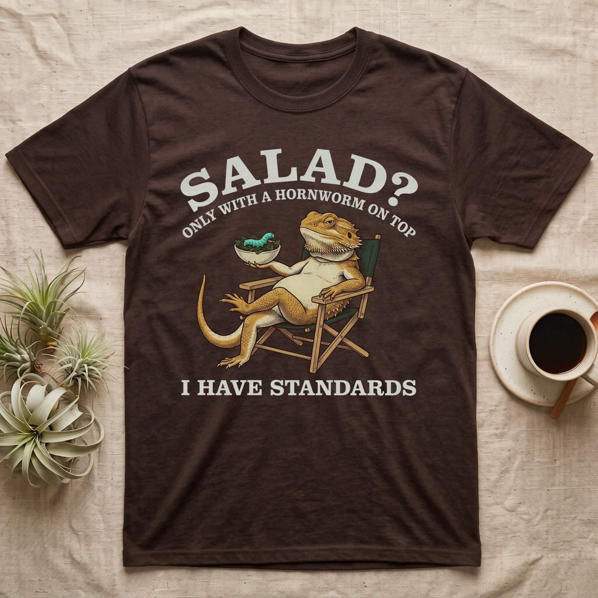Bearded Dragon Standards T-Shirt in Dark Chocolate — Engraved bearded dragon in a camp chair holding greens topped with a hornworm under text Salad? Only With a Hornworm on Top