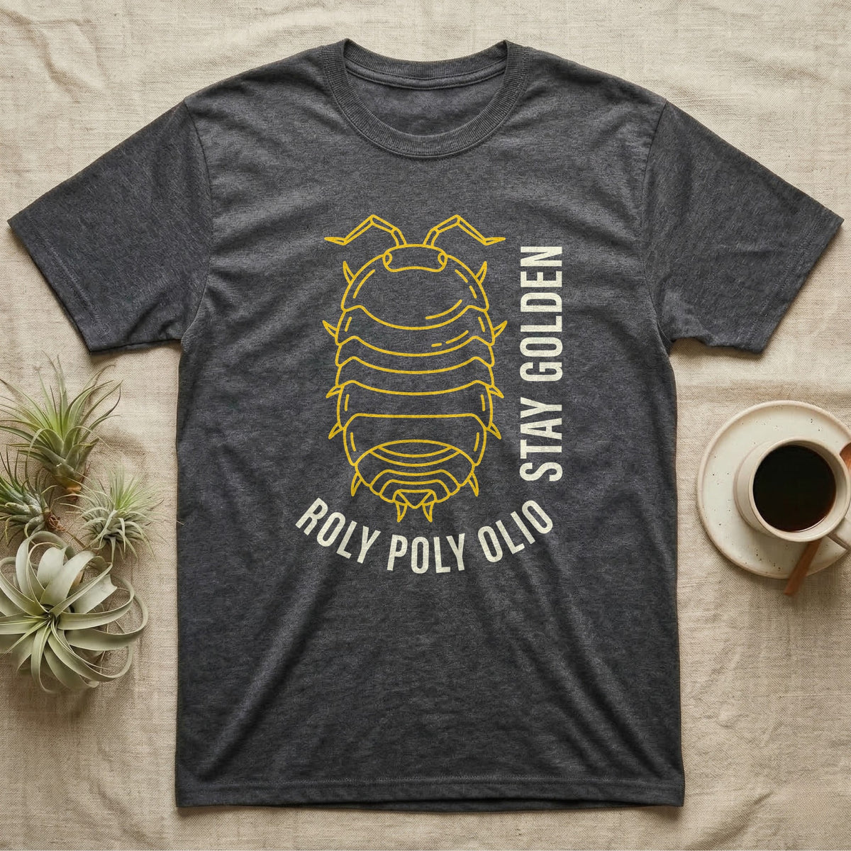 Roly Poly Isopod Stay Golden T-Shirt in Dark Heather — Golden outline drawing of a spined roly poly isopod beside vertical cream "Stay Golden" lettering.