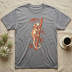 Grey t-shirt featuring an orange crested gecko climbing a bamboo stalk.