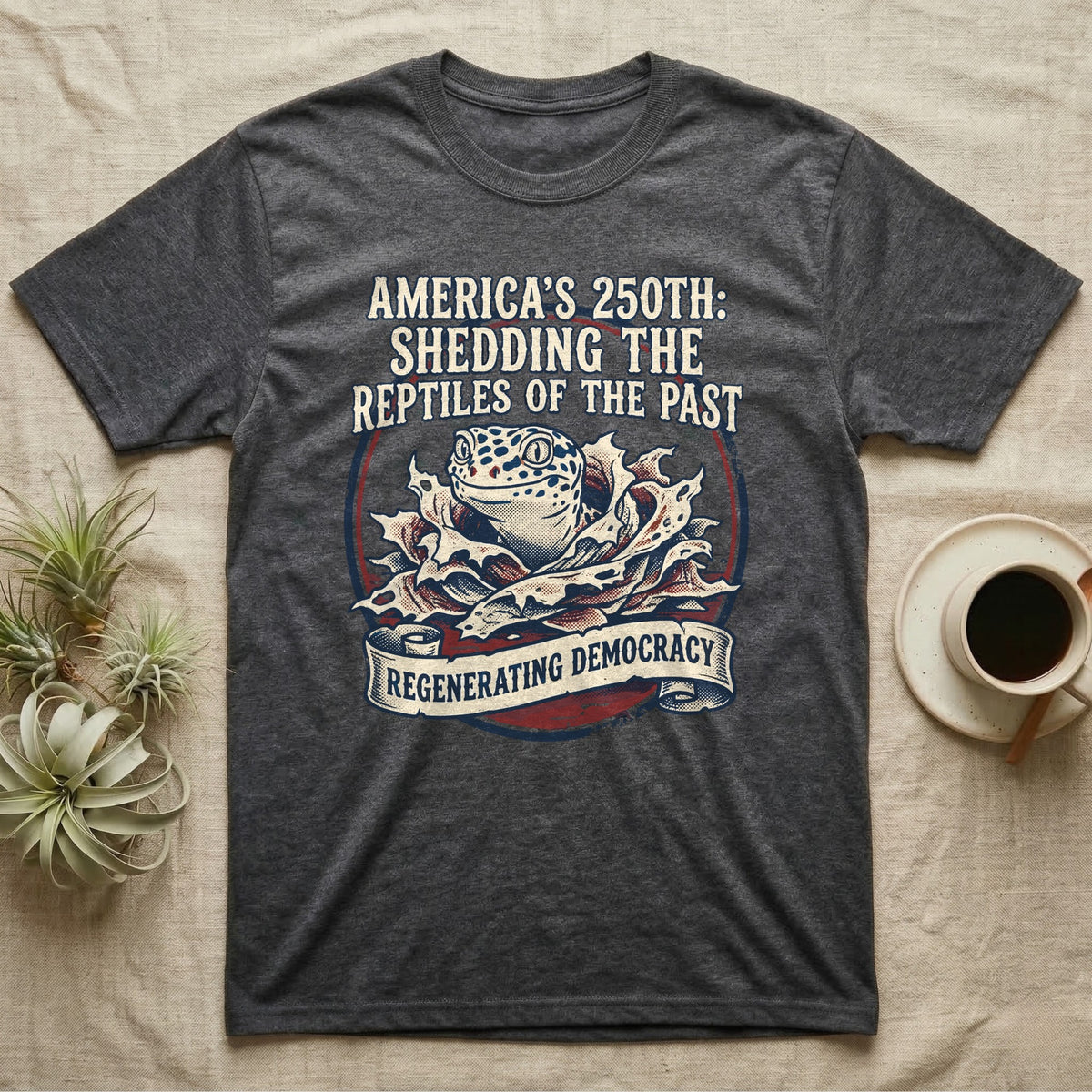 Leopard Gecko Shedding Tee in Dark Heather — Vintage badge of a leopard gecko emerging from its shed skin, navy and red emblem reading Shedding The Reptiles Of The Past, on black.