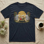 Sulcata Hibiscus Thief T-Shirt in Navy — Painted 90s wildlife art of a sulcata tortoise walking through a broken picket fence with a red hibiscus flower in its beak