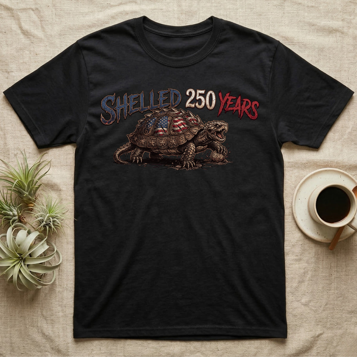 Snapping Turtle 250 T-Shirt in Black — Gritty woodcut alligator snapping turtle with a flag-etched shell on a 250 coin under text Shelled 250 Years.