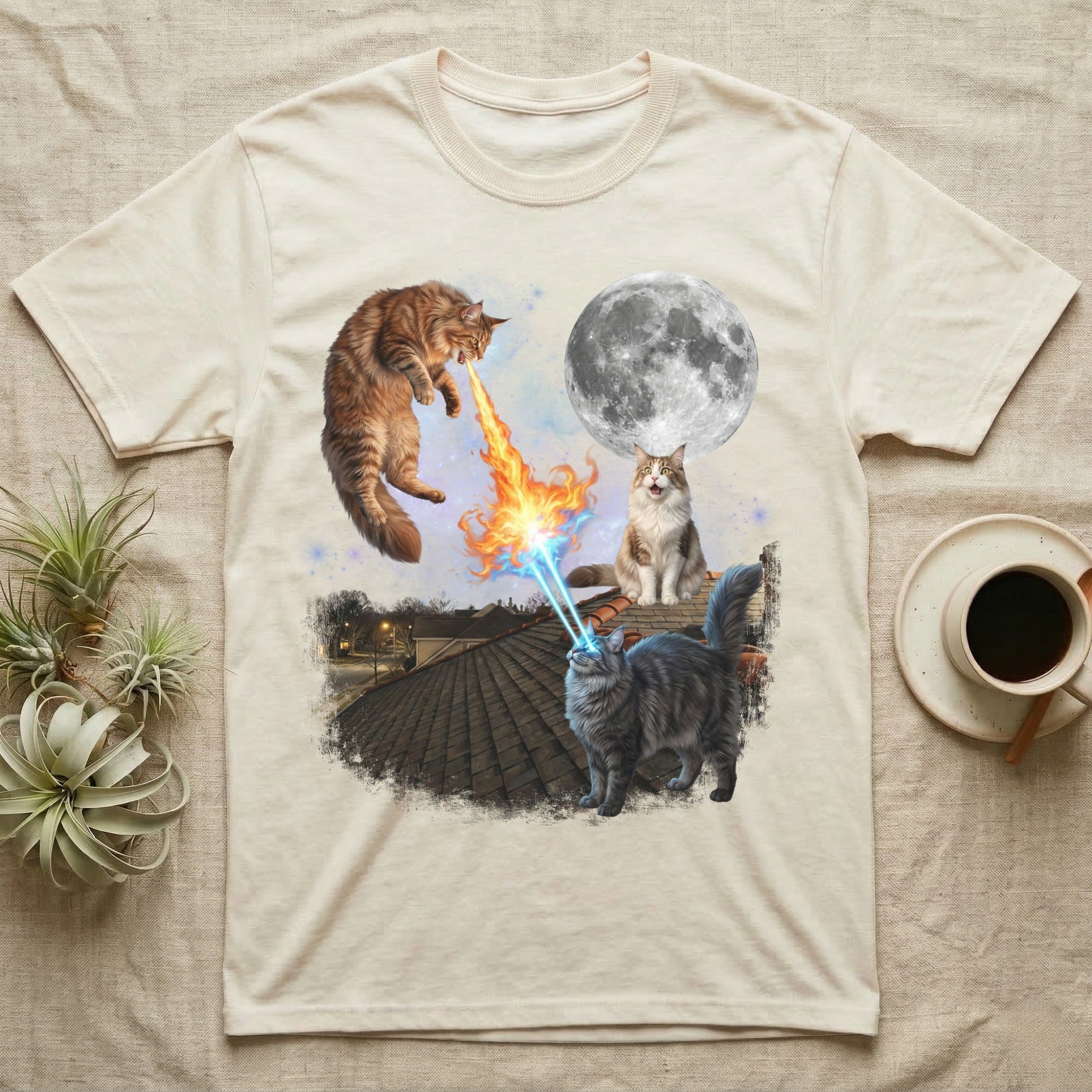 Two cats, one breathing fire and the other shooting lasers, on a rooftop under a moon.