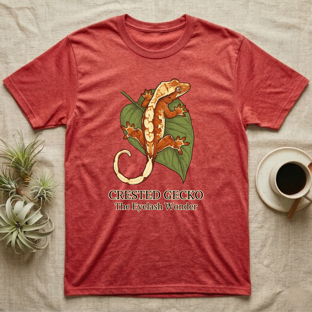 Red t-shirt with crested gecko and leaf graphic and text "CRESTED GECKO The Eyelash Wonder".