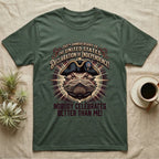 Bearded Dragon Declaration T-Shirt in Military Green — Ornate engraved bearded dragon portrait in a tricorn hat on a cream sunburst with Nobody Celebrates Better Than Me.