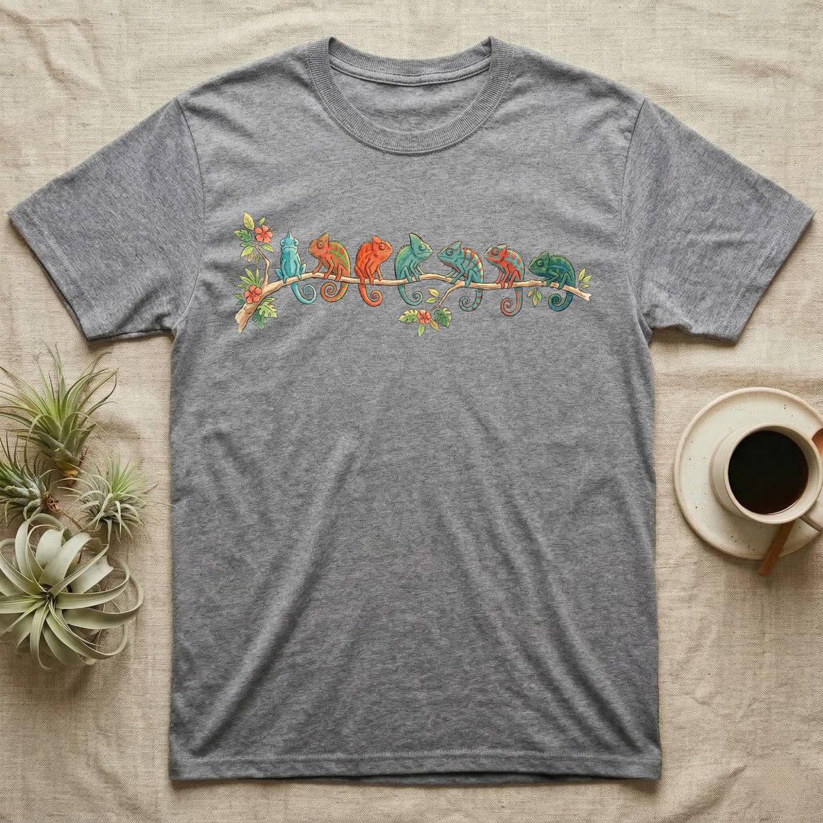 Panther Chameleon Canopy Crew T-Shirt in Sport Grey — Watercolor illustration of seven panther chameleons in Madagascar locale colours on a branch, dark grey T-shirt design.