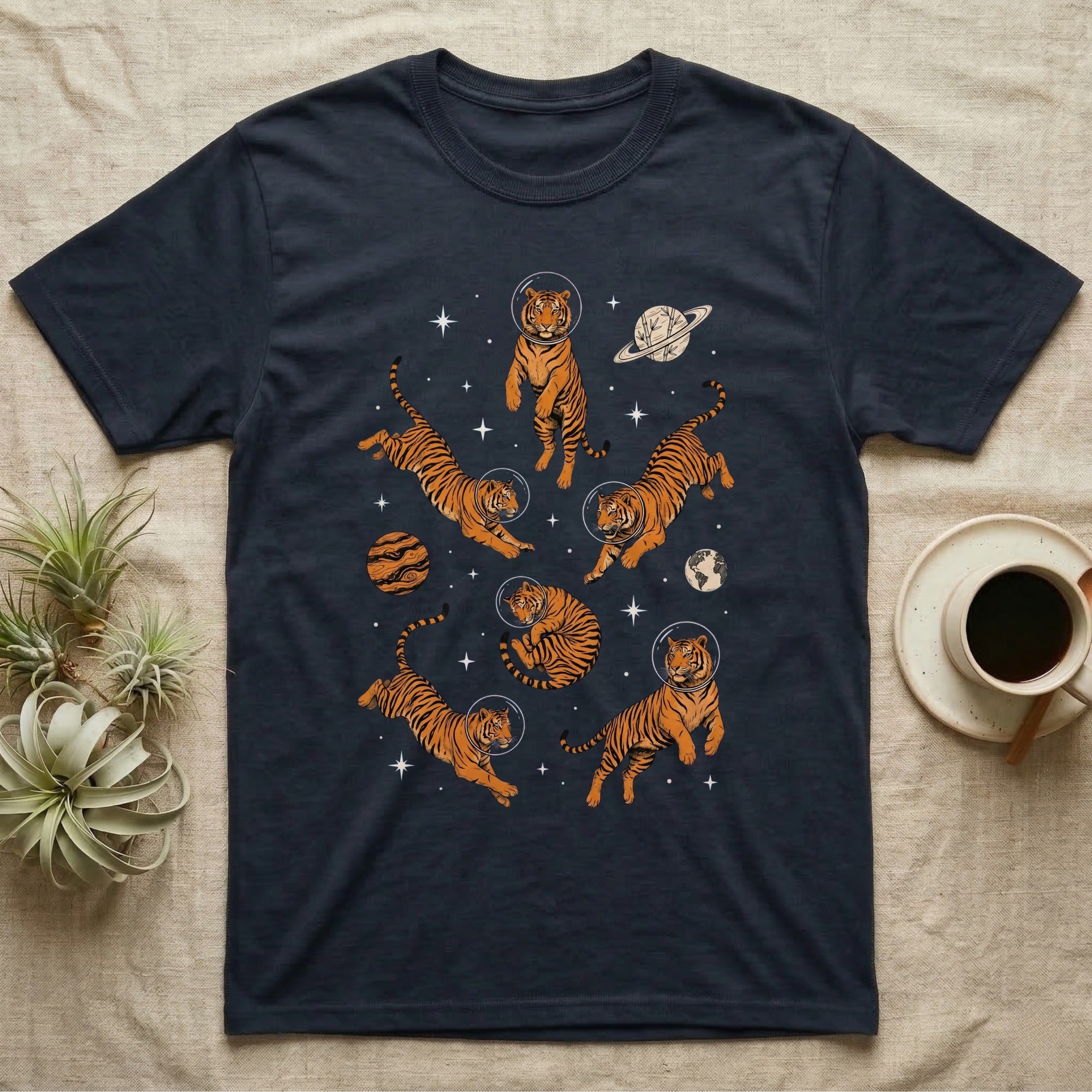 T-shirt with cartoon tigers in space with planets and stars.